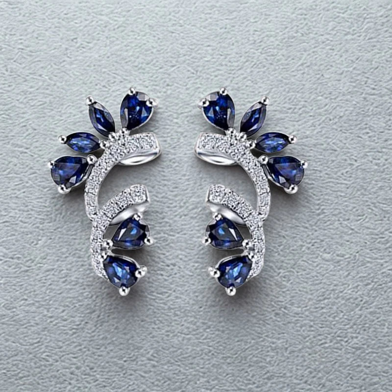 Boucles d’oreilles créoles en argent avec pierres bleues style saphir