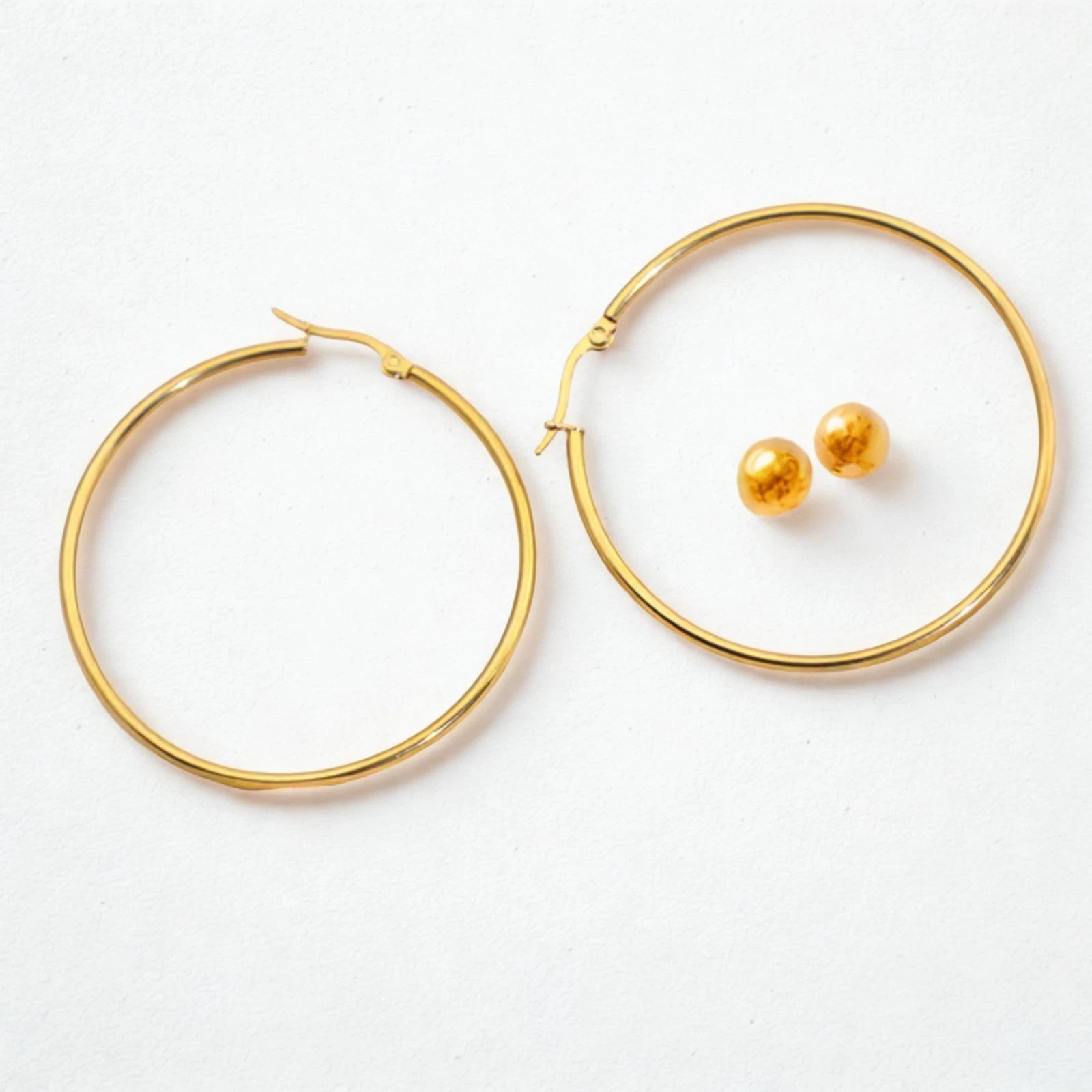 Boucles d'oreilles créoles dorées 60 mm